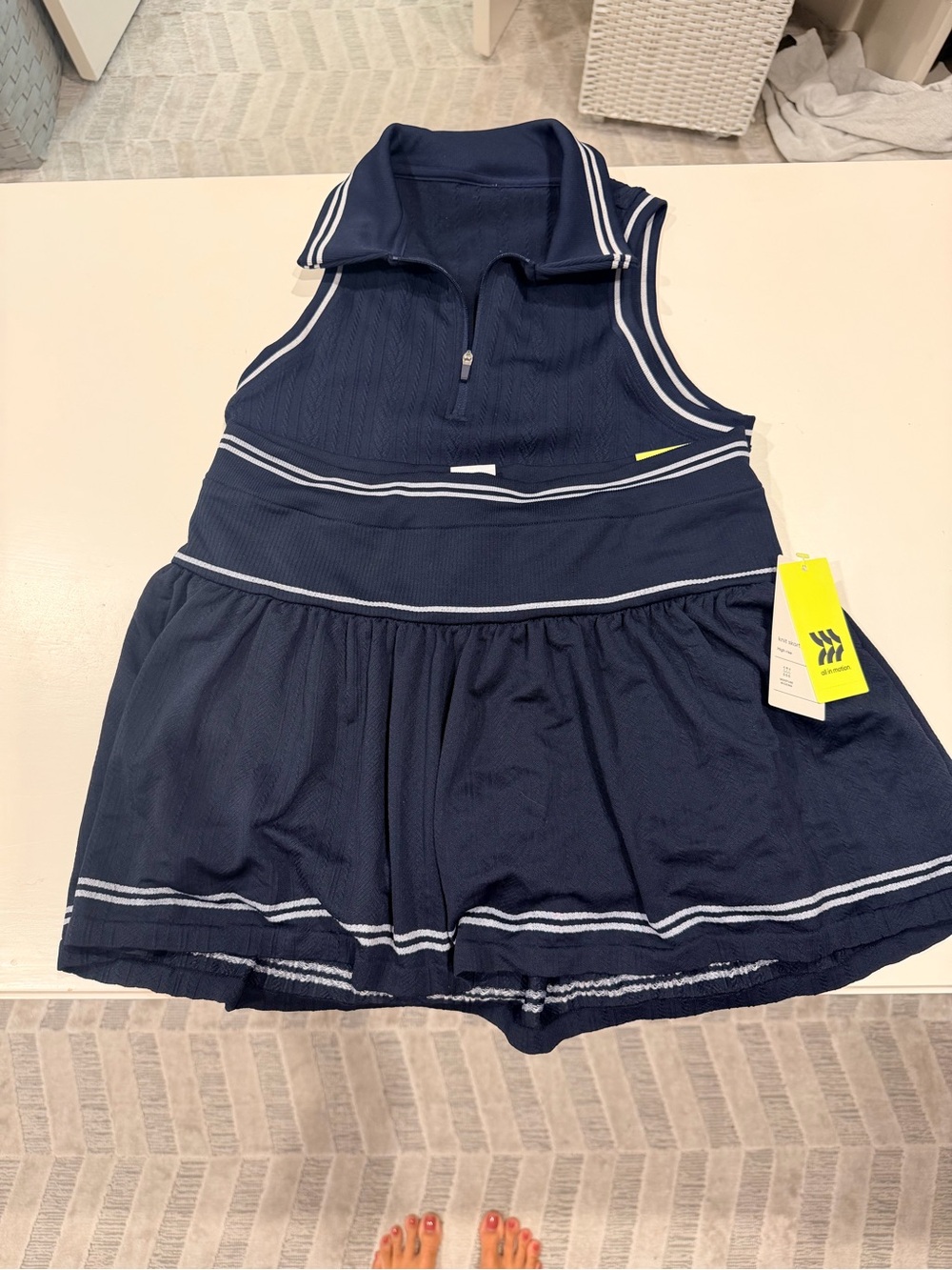 Navy all in motion Tennis skirt and top with White Stripe Detail
